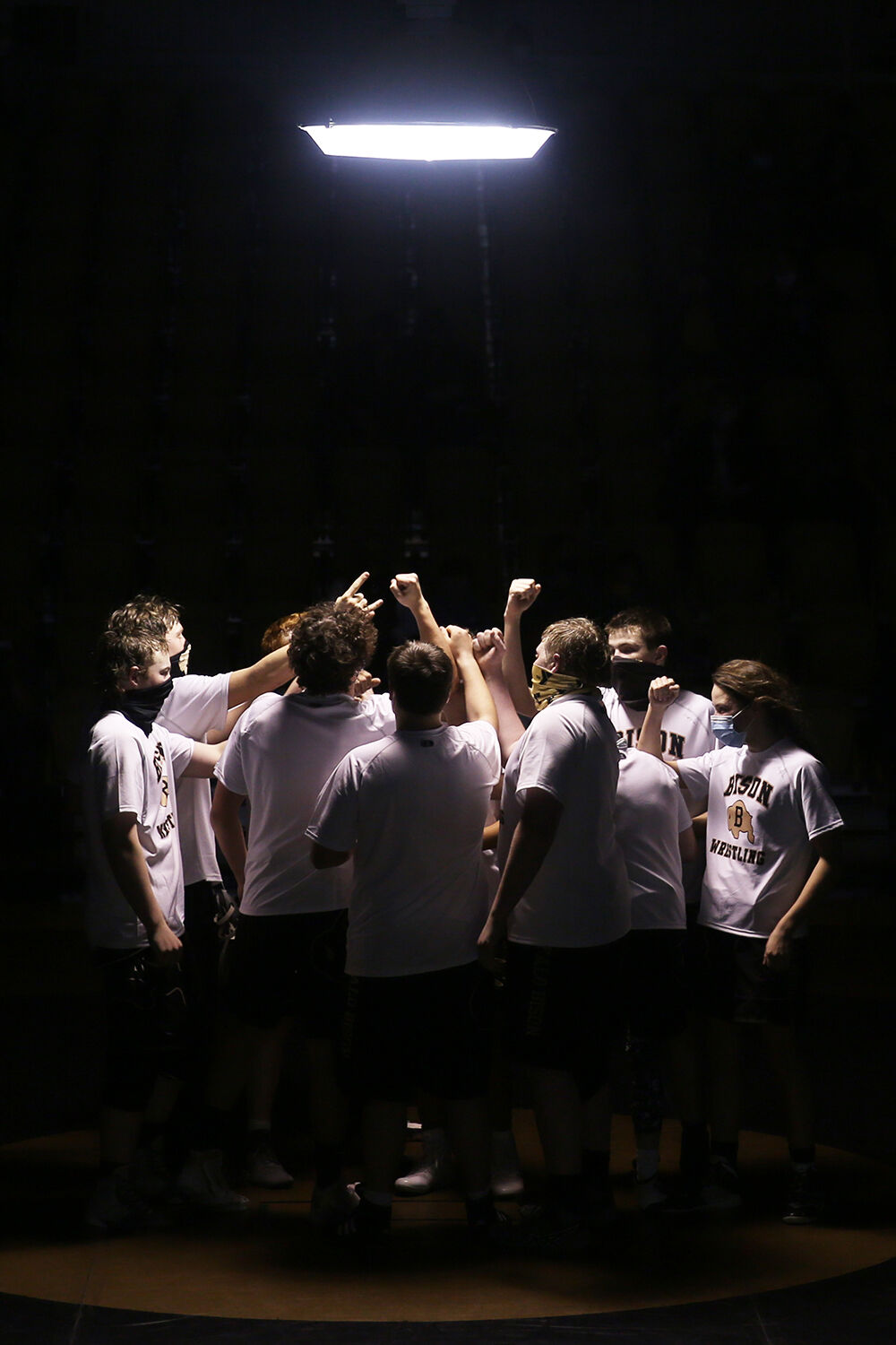 Buffalo High School’s wrestling team huddles